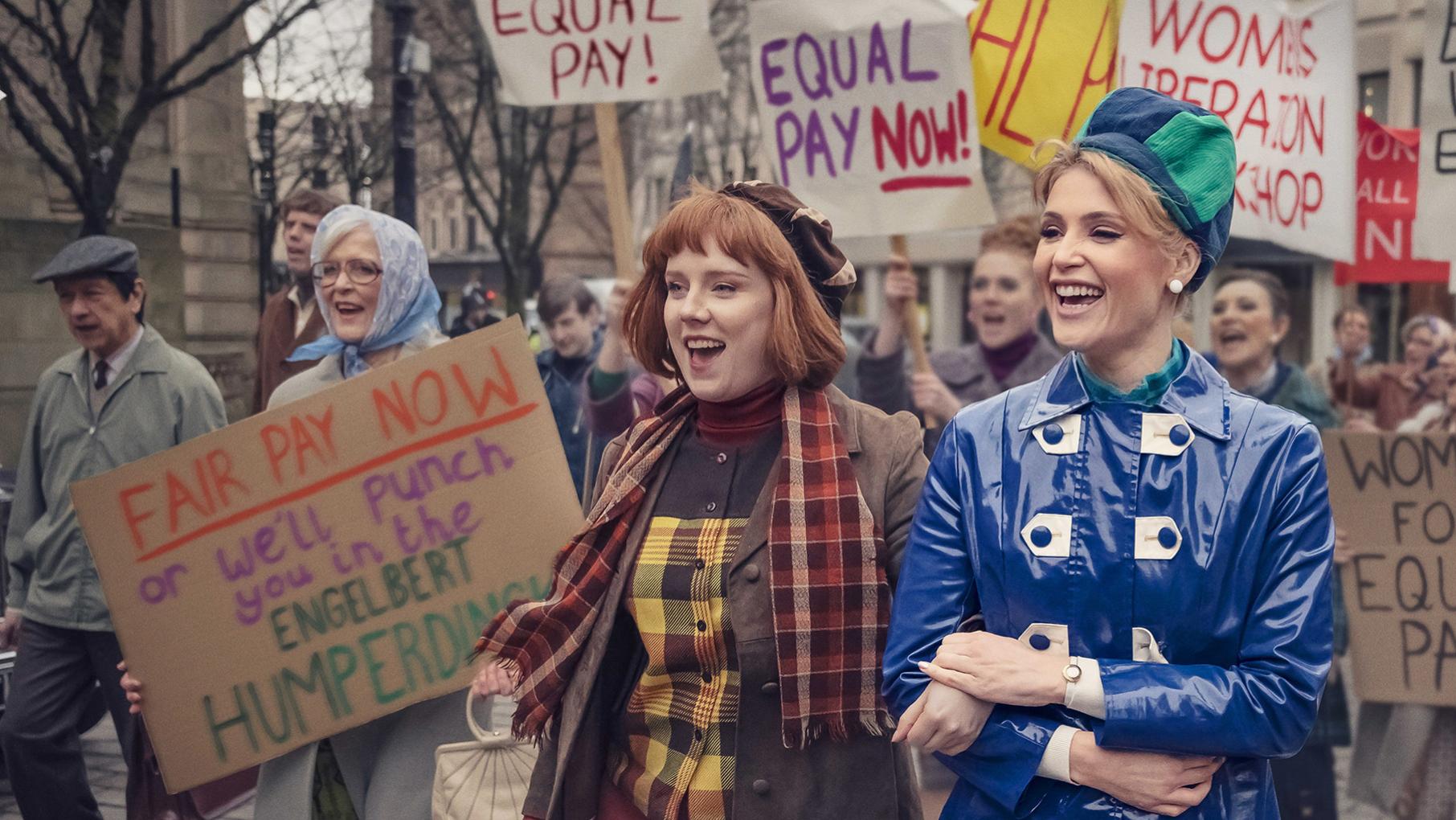 Barbara decides to lend her star power to Marge's march for equal pay. Credit: Potboiler Productions and Sky UK Limited Barbara and Marge march arm-in-arm at an equal pay protest