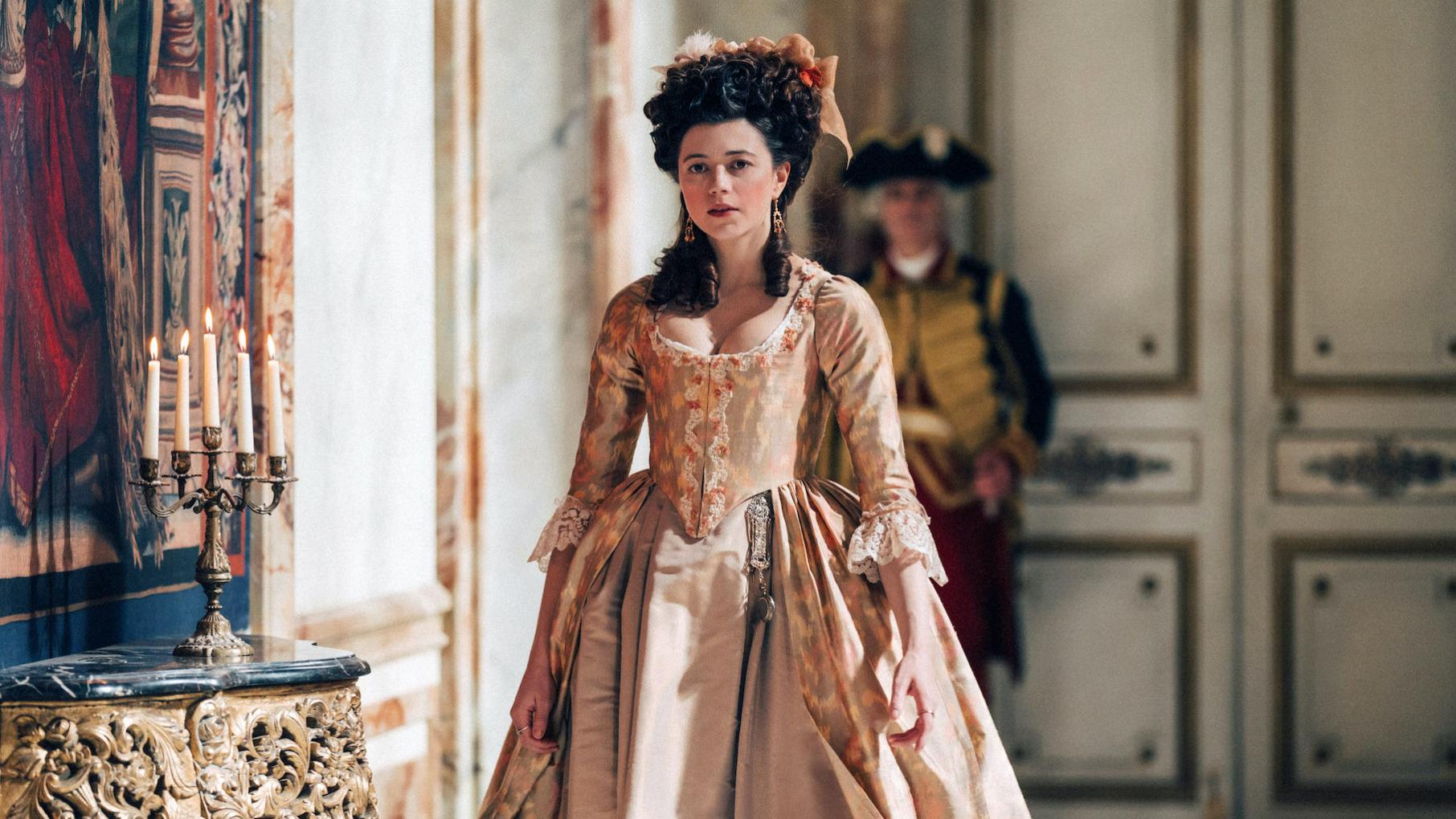 Antoinette accepts Lamballe back into her inner circle, leading her to discard Yolande. Credit: Caroline Dubois for Capa Drama and Canal Plus The Princess de Lamballe stands in a dress