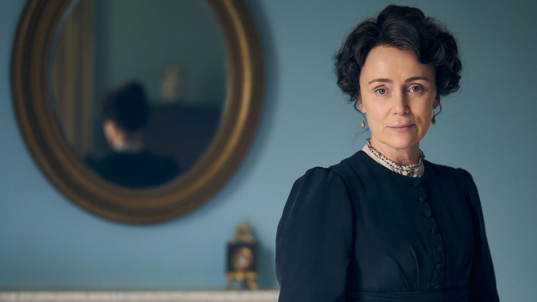 Cassandra Austen rushes off to recover her sister Jane's letters lest they reveal things to the public about the famous author. Credit: Robert Viglasky Photography Cassandra Austen stands in front of a mirror on a wall and looks at the camera
