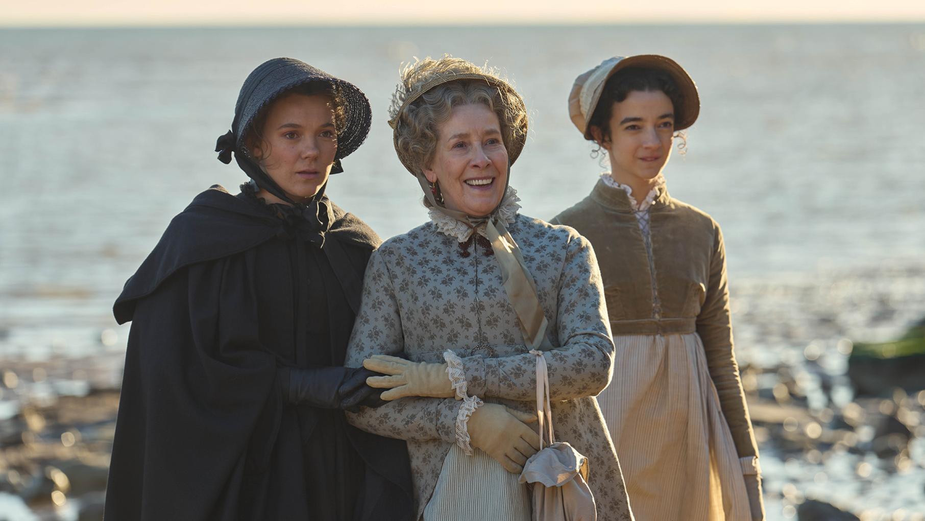 The Austens enjoy a seaside holiday, and meet an admirable, handsome man. Credit: Masterpiece The Austen women stand on the beach