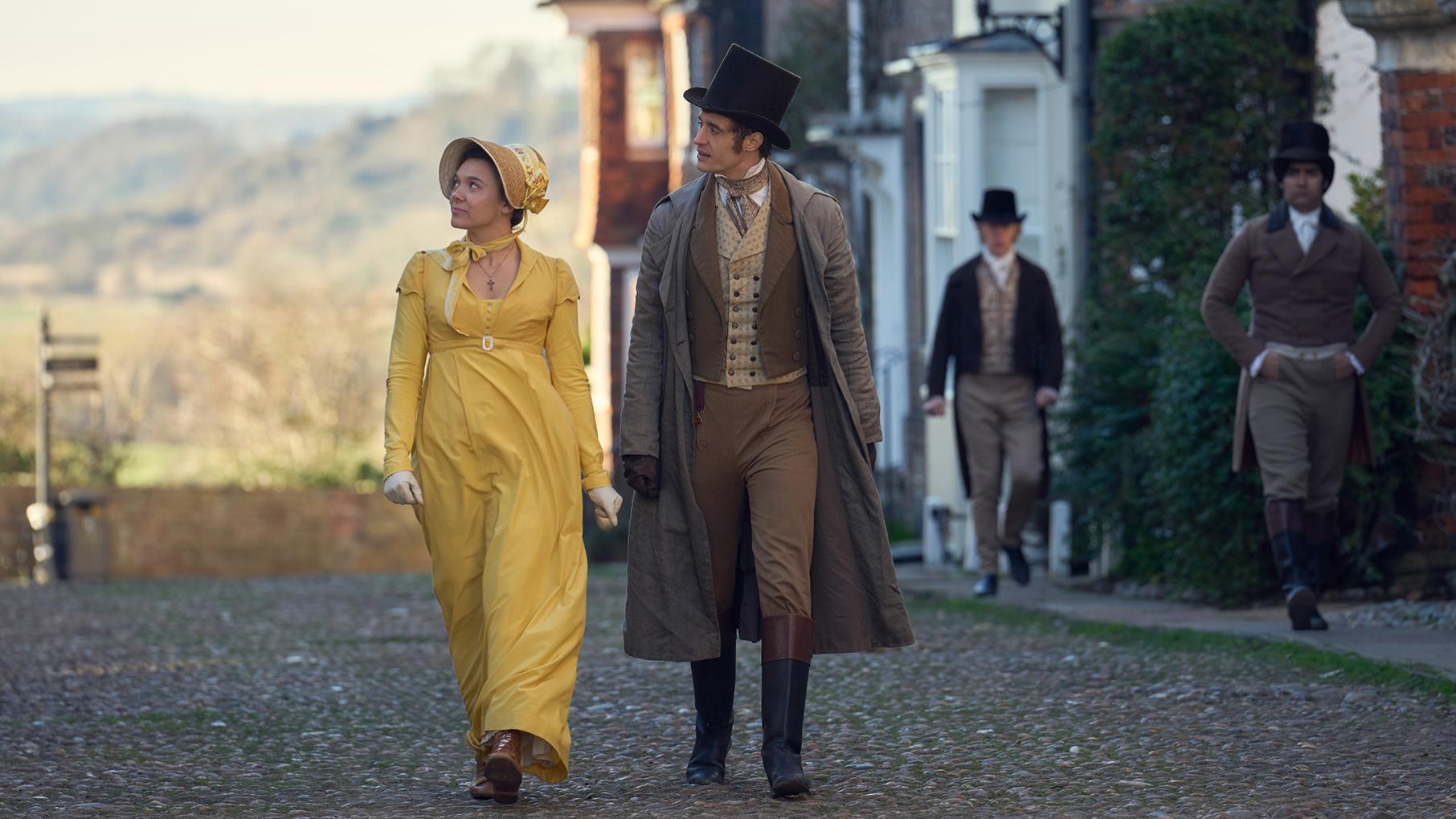 Cassy finds herself facing a wrenching choice in the question of Henry Hobday and her future. Credit: Masterpiece Cassy in a yellow dress walks down a street with Henry Hobday