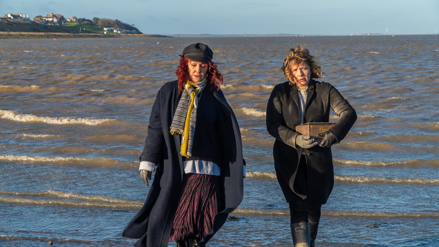 The discovery of a decades-old body brings up difficult history for Dolly and Pearl Dolly and Pearl walk away from the sea holding a box