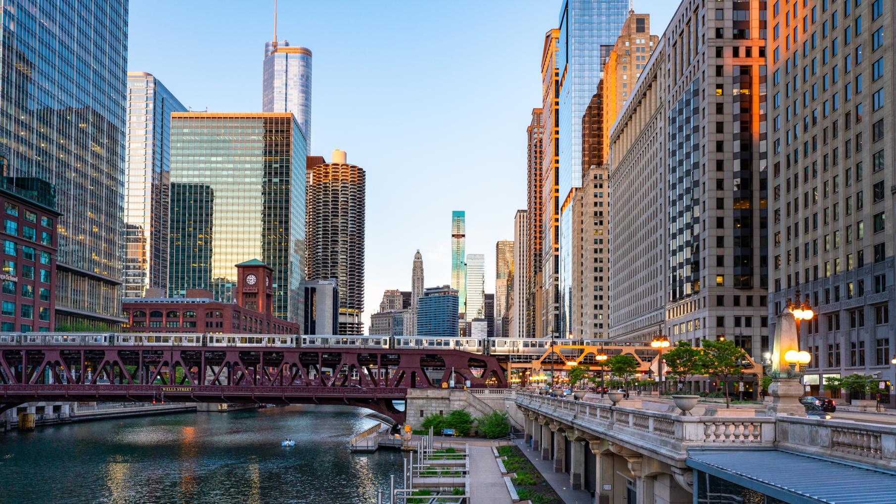 An aerial view of the Chicago River Walk, looking east through the buildings near Wells Street Bridge. 
