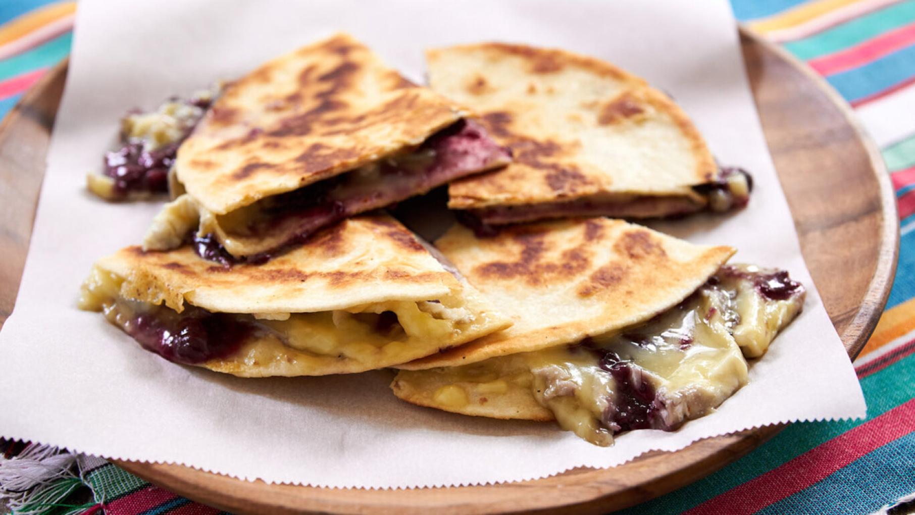 A plate with quesadillas on it
