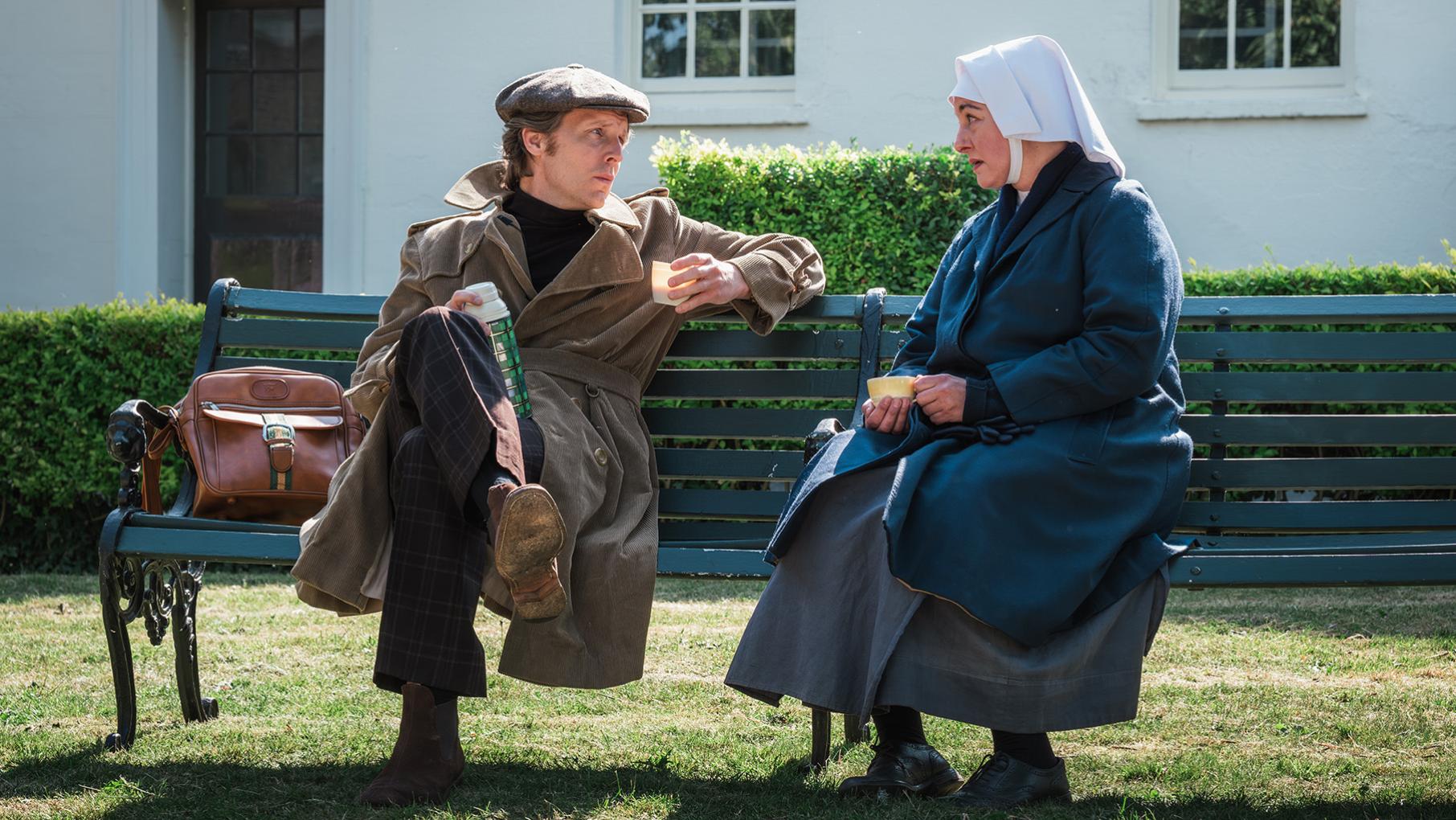 Geoffrey and Sister Veronica sit on a bench together