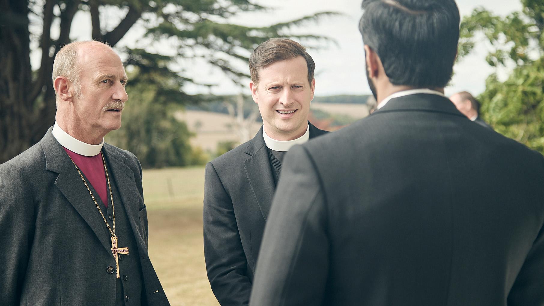 The bishop and the vicar John Planer speak to Alphy outside