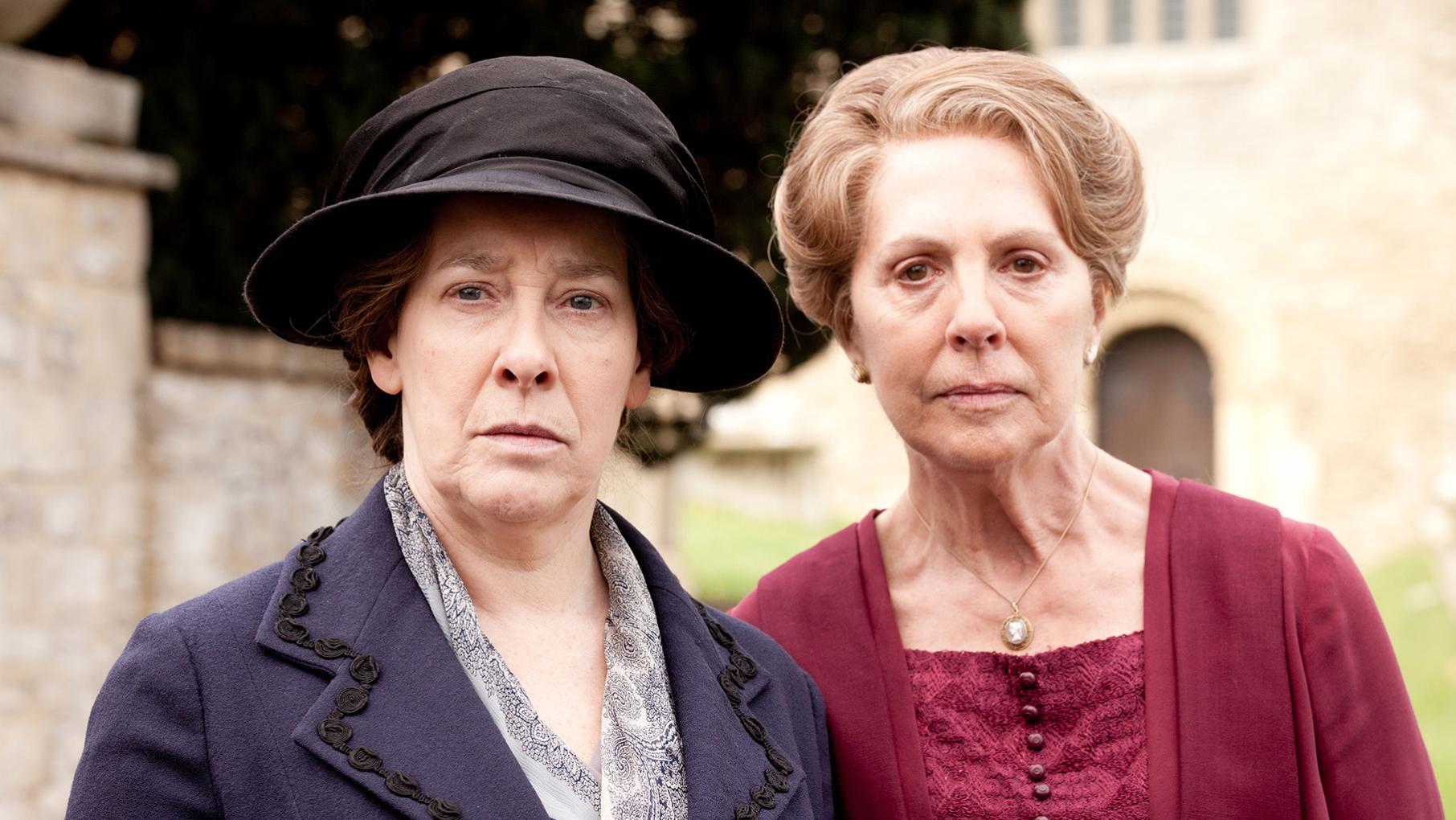 Two women look stern