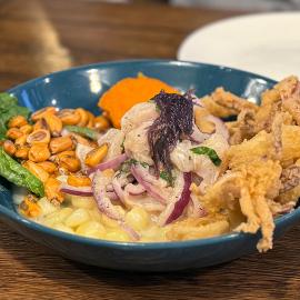 Ceviche carretillero in a blue bowl from Avenida Peru