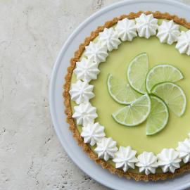 A key lime pie on a blank background