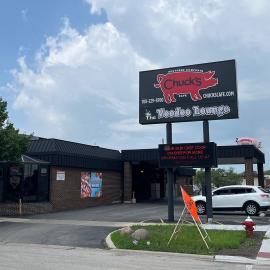 The sign and exterior of Chuck's Southern Comforts restaurant