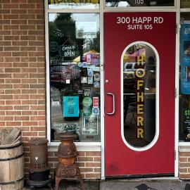 The door and facade of Hofherr Meat Co.