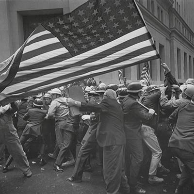 Construction workers and police clash during pro-Vietnam War demonstration in New York City. 1970. Photo: Benedict J. Fernandez