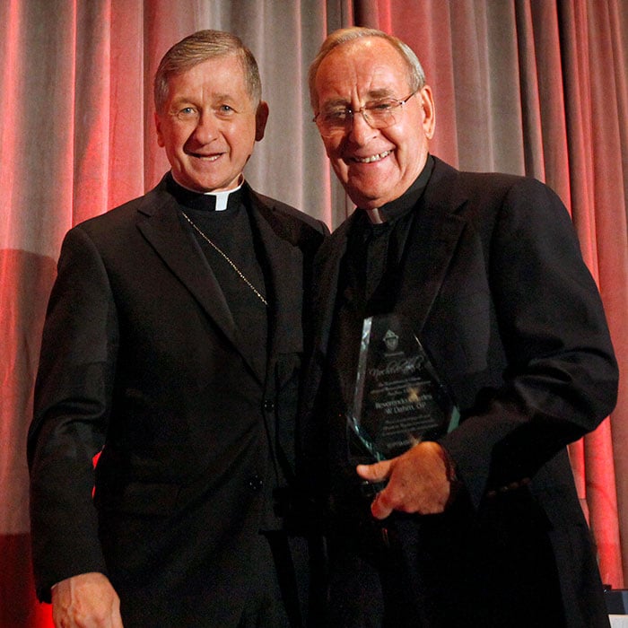 with cupich rec John xxiiii award for outstanding work in hisp min
